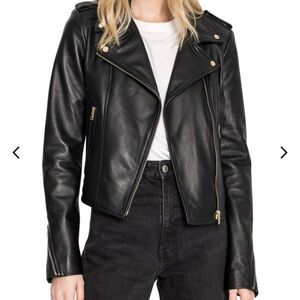 LaMarqué Donna leather biker jacket used once in excellent condition .